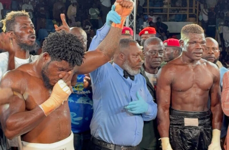 Boxing fans sit in rain to watch as Baubali bows to the beast, Dickson